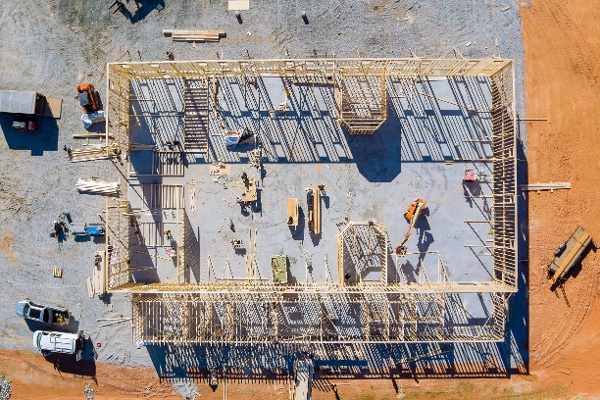 aerial-view-framing-of-beams-on-new-home-under-con-2022-01-25-21-09-37-utc-1