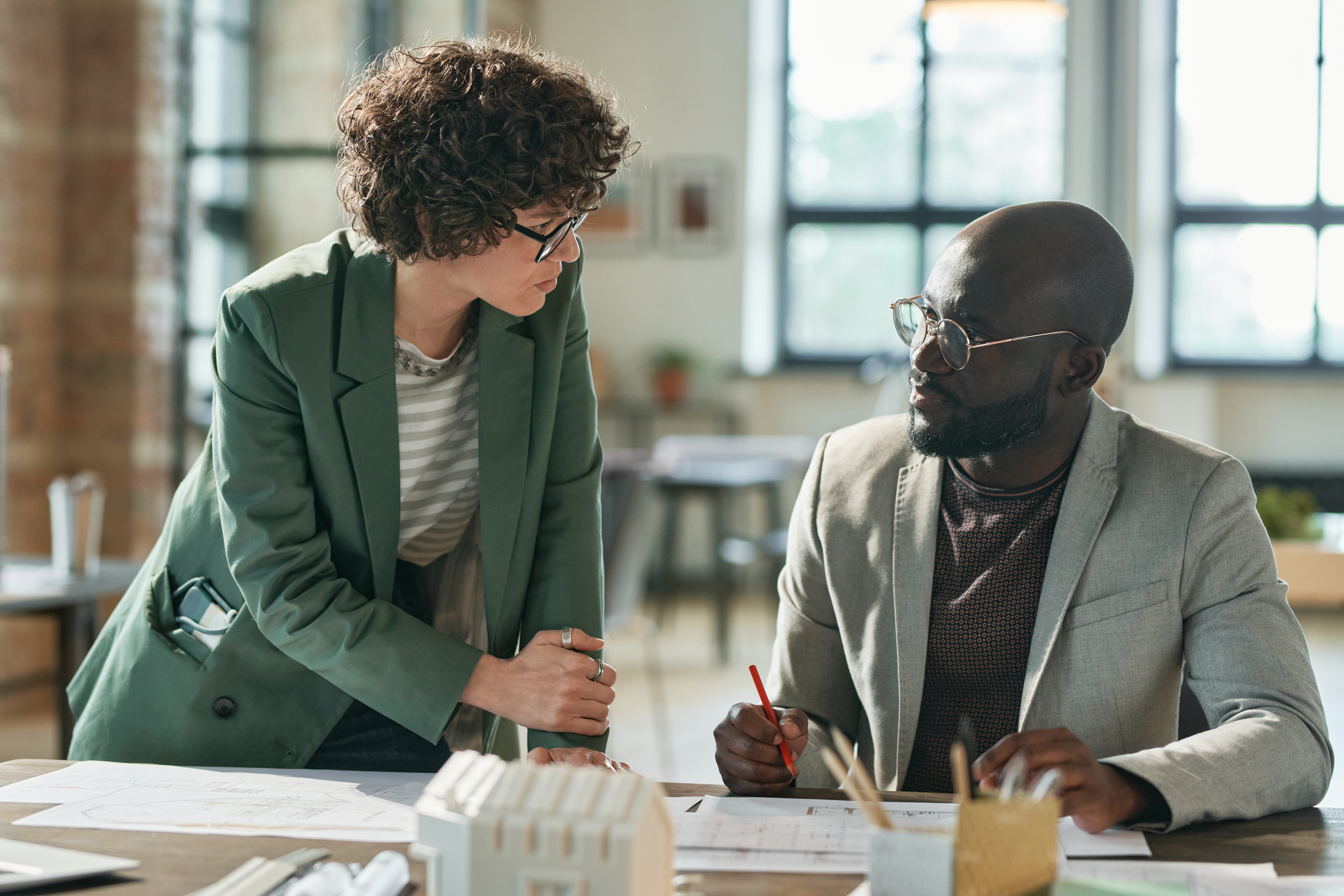 Architect and Engineer Collaborating on a Project